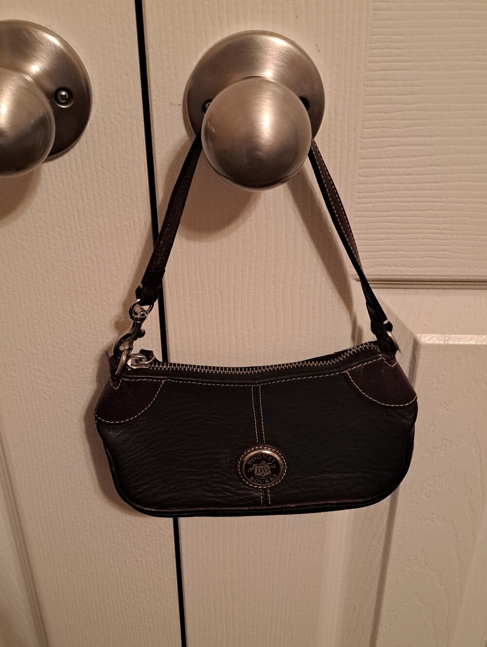 Dooney and Bourke Black Women's Wristlet Shoulder Bag - Great piece with flaws.